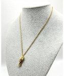 Подвеска   Panth?re Necklace выполнена из жёлтого золота 750 пробы, украшена цаворитом и ониксом Cartier Артикул LUX-116351. Вид 1